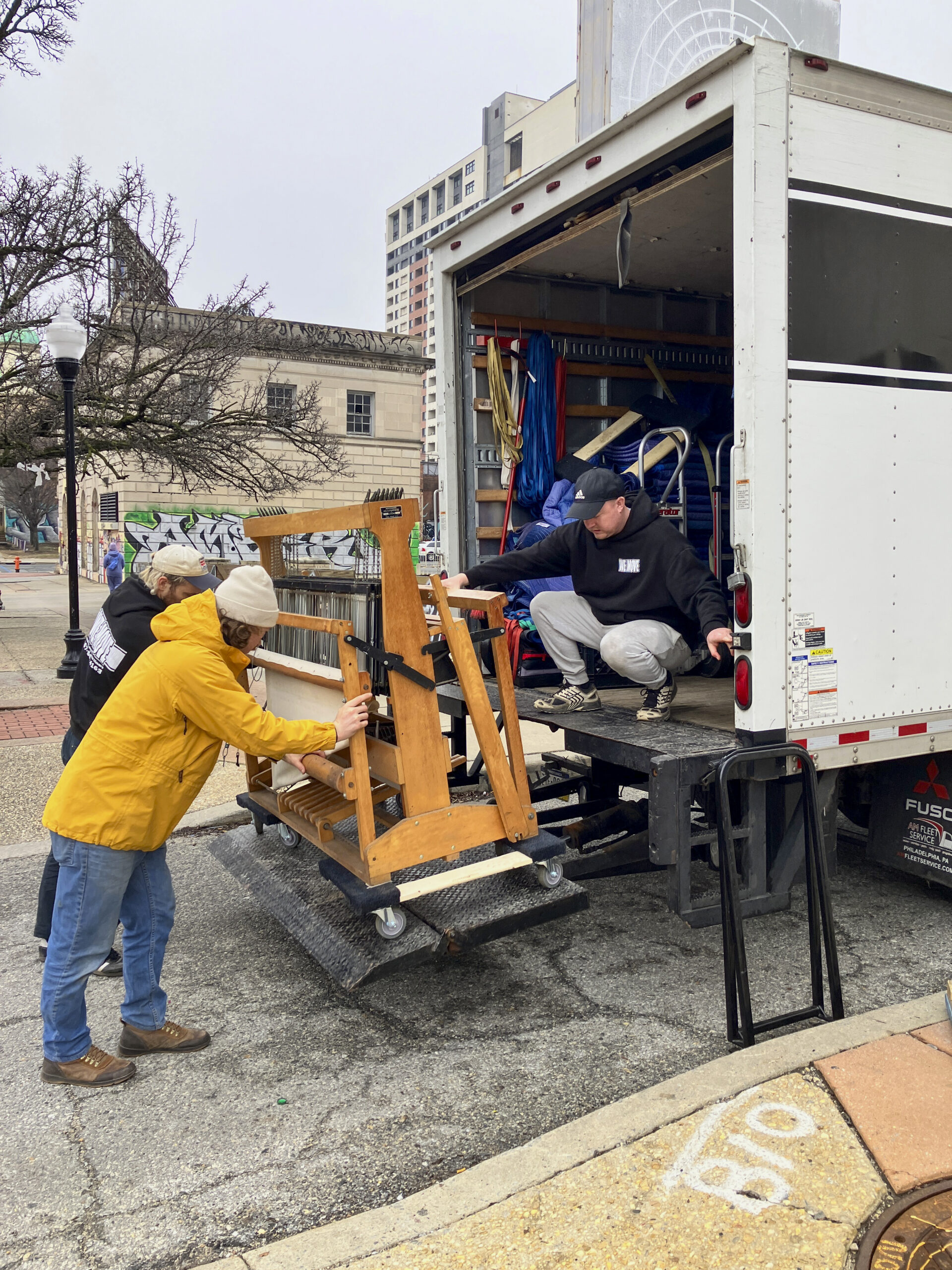 WeMove movers from Philadelphia unloading looms shipped from Weaver House to Johns Hopkins University Visual Arts; 2026